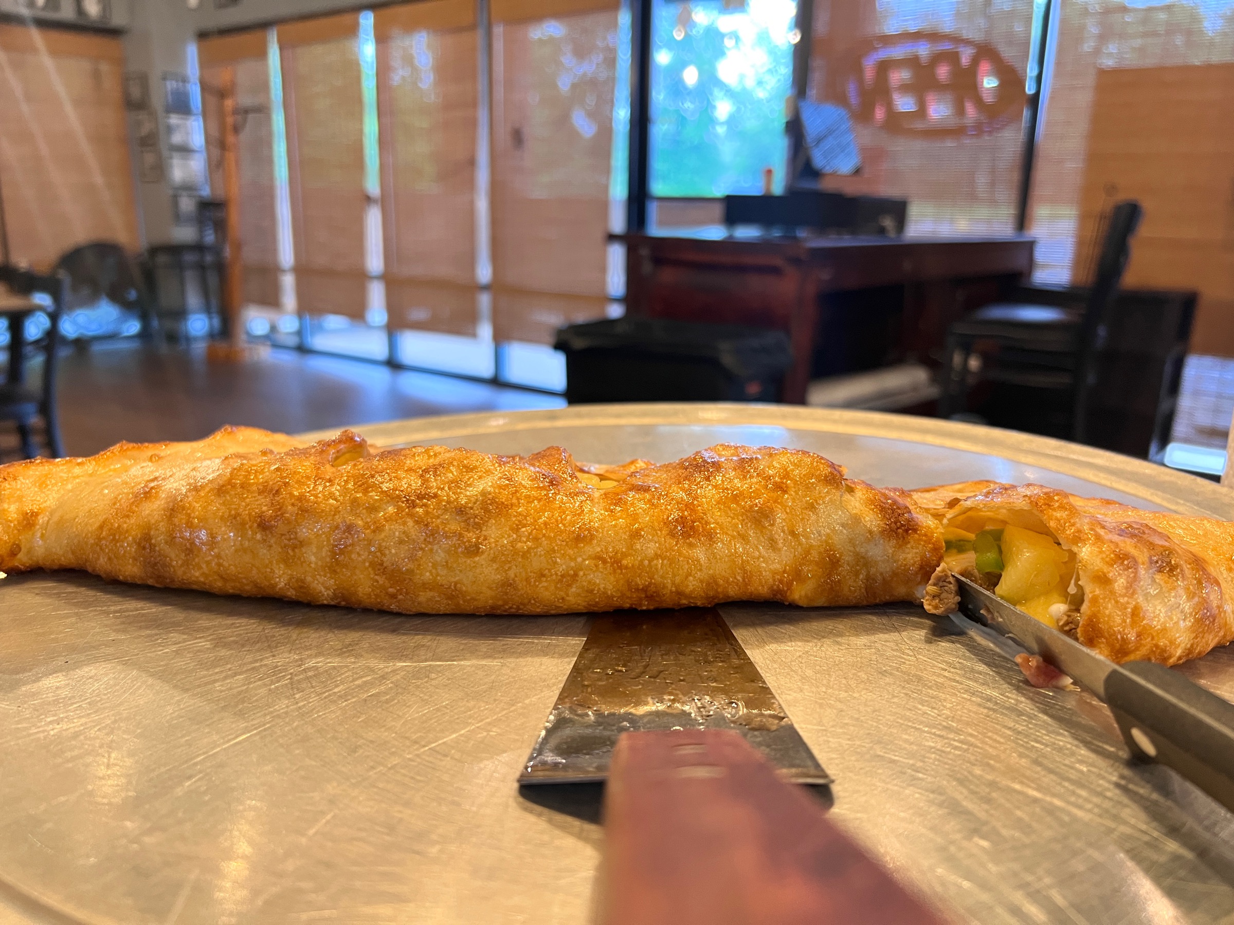<p><strong>Made-To-Order Calzones Fresh From The Oven</strong></p><p>When dinner calls for something warm, cheesy, and a little bit unexpected—Frannie’s Kitchen delivers, literally. Last night’s calzone was a customer favorite: hand-crafted with Italian sausage, sautéed green peppers, sweet onions, a splash of pineapple 🍍, and loaded with extra cheese 🧀, all folded into our golden, perfectly baked dough.</p><p>Every calzone we make is tailored just for you—built with your choice of fillings, sealed with care, and baked to a crisp, gooey finish. Whether you like it classic or want to get creative, we’re ready to roll (and bake) it your way.</p><p>Frannie’s Kitchen isn’t just a spot for comfort food—it’s where custom cravings come to life. Come in hungry. Leave smiling. 😋</p><p>📍 Dine in, take out, or call ahead for pickup.</p>